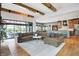 Expansive living room showcases open layout to kitchen and dining area, and cozy seating at 5120 Melbourne Pl, Zionsville, IN 46077