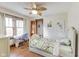 Bedroom featuring a desk with chair and a comfortable bed with a pull-out trundle at 5330 Manker St, Indianapolis, IN 46227
