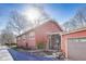 Exterior of home with driveway and well manicured lawn with mature landscaping at 5330 Manker St, Indianapolis, IN 46227