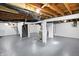 Spacious basement featuring a high ceiling and exposed ductwork at 5350 E 20Th Pl, Indianapolis, IN 46218