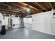 Spacious unfinished basement showing mechanicals and white concrete walls at 5350 E 20Th Pl, Indianapolis, IN 46218