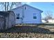 The exterior shows a shed and the back of the house at 553 N Traub Ave, Indianapolis, IN 46222