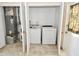 Efficient laundry room with washer, dryer, water heater and furnace at 553 N Traub Ave, Indianapolis, IN 46222