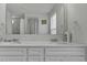 Bathroom featuring a double sink vanity with a framed mirror at 5540 Arrowgrass Ct, Noblesville, IN 46062