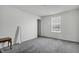 This carpeted bedroom has natural light coming in from the window at 5540 Arrowgrass Ct, Noblesville, IN 46062