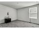Carpeted room featuring a sewing machine, lamp, and natural light at 5540 Arrowgrass Ct, Noblesville, IN 46062