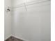 An empty closet with carpeted flooring features a wire shelf at 5540 Arrowgrass Ct, Noblesville, IN 46062