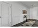 Bright hallway with white trim, hardwood flooring, and decorative accents at 5540 Arrowgrass Ct, Noblesville, IN 46062