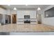 Bright kitchen featuring granite countertops, stainless steel appliances, and ample cabinet space at 5540 Arrowgrass Ct, Noblesville, IN 46062