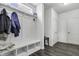 Convenient mudroom with built-in bench, coat hooks, and storage for entryway organization at 5540 Arrowgrass Ct, Noblesville, IN 46062