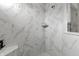Tiled shower stall with a rain shower head and built-in shelves at 5540 Arrowgrass Ct, Noblesville, IN 46062