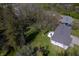 Home with a private backyard, deck, and mature trees at 5836 Andover Rd, Indianapolis, IN 46220