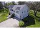 Aerial view of a home with a two car garage and beautiful landscaping at 5836 Andover Rd, Indianapolis, IN 46220