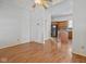 Open-concept living room with hardwood floors flows into a kitchen area with island at 602 Prospect St, Indianapolis, IN 46203