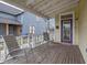 Cozy front porch featuring a seating area with chairs and a small table, perfect for relaxing outdoors at 602 Prospect St, Indianapolis, IN 46203