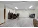 Spacious basement with wet bar and office space, great for entertaining and working from home at 6043 Acorn Dr, Columbus, IN 47201