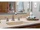 Close up of bathroom sink vanity with neutral countertop and brushed nickel faucet at 6043 Acorn Dr, Columbus, IN 47201