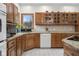 Spacious kitchen with ample storage, granite counters, and modern appliances at 6043 Acorn Dr, Columbus, IN 47201