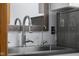 Close up on the Laundry Sink with mirror and chrome faucet at 6043 Acorn Dr, Columbus, IN 47201