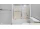 Clean bathroom shower stall with sliding glass doors and tile flooring at 6043 Acorn Dr, Columbus, IN 47201
