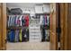 Walk-in closet featuring organized shelving, drawers, and storage containers at 6043 Acorn Dr, Columbus, IN 47201
