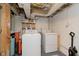 Laundry room featuring white washer and dryer at 6721 Evanston Ave, Indianapolis, IN 46220