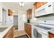 Bright kitchen featuring granite counters, modern appliances, and ample cabinet space at 6721 Evanston Ave, Indianapolis, IN 46220