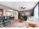 Open-concept living room with a dining area, comfortable seating, and plenty of natural light at 6721 Evanston Ave, Indianapolis, IN 46220