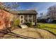 Backyard patio with brick home and enclosed porch at 7021 Warwick Rd, Indianapolis, IN 46220