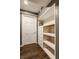 Basement storage area with built-in drawers and shelves at 7021 Warwick Rd, Indianapolis, IN 46220