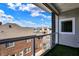 Balcony offers outdoor living and views of neighboring houses and blue sky at 932 Broadway St # 15, Indianapolis, IN 46202
