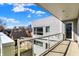 This beautiful balcony features glass railings and a gorgeous view of the city at 932 Broadway St # 15, Indianapolis, IN 46202