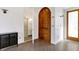 Modern bathroom showcasing an arched doorframe, glass shower, and neutral tones at 932 Broadway St # 15, Indianapolis, IN 46202