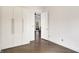 Bedroom with built-in wardrobe/closet and wood flooring, offering ample storage at 932 Broadway St # 15, Indianapolis, IN 46202