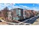 Modern townhome featuring large windows and sleek architectural design for stylish urban living at 932 Broadway St # 15, Indianapolis, IN 46202