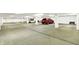Spacious parking garage with designated parking spots and ample space for vehicles and bikes at 932 Broadway St # 15, Indianapolis, IN 46202
