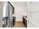 Kitchen with stainless steel refrigerator, stove, oven, and countertops at 932 Broadway St # 15, Indianapolis, IN 46202