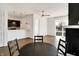 Open-concept living space featuring sleek hardwood floors and recessed lighting at 932 Broadway St # 15, Indianapolis, IN 46202
