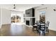 Inviting living area featuring neutral walls, modern fireplace, and hardwood floors at 932 Broadway St # 15, Indianapolis, IN 46202