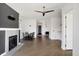 Cozy living room featuring a modern fireplace and ample space for entertaining at 932 Broadway St # 15, Indianapolis, IN 46202