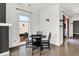 Bright living room area near a modern kitchen featuring sleek countertops and an open layout at 932 Broadway St # 15, Indianapolis, IN 46202
