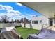 This rooftop deck with faux grass offers plenty of room for seating and entertaining at 932 Broadway St # 15, Indianapolis, IN 46202