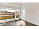 Bright room with large windows and hardwood floors, creating a welcoming space at 932 Broadway St # 15, Indianapolis, IN 46202