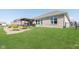 Spacious backyard with lush green lawn, patio and garden, perfect for outdoor living and entertainment at 981 Mound St, Bargersville, IN 46106