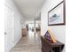 Welcoming foyer with hardwood floors and decor leading into the home's open living spaces at 981 Mound St, Bargersville, IN 46106