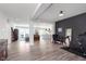 Bright and airy living room, showcasing open floor plan with adjoining kitchen and dining areas at 981 Mound St, Bargersville, IN 46106