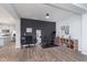 Spacious open-concept living area with dark accent wall perfect for a home office or exercise space at 981 Mound St, Bargersville, IN 46106