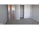 A light-filled bedroom features neutral walls and plush carpeting at 10609 Banyan Wood Ct, Indianapolis, IN 46239