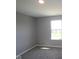 A bedroom with gray walls and carpet at 10609 Banyan Wood Ct, Indianapolis, IN 46239