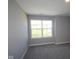 Bedroom with light-filled windows at 10609 Banyan Wood Ct, Indianapolis, IN 46239